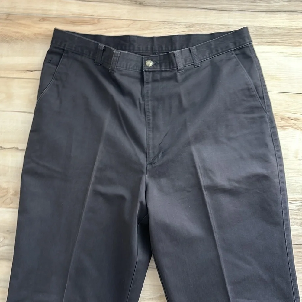 Haggar Mens Black Khaki Pants. Excellent Condition. 38 waist and 33 inch inseam.